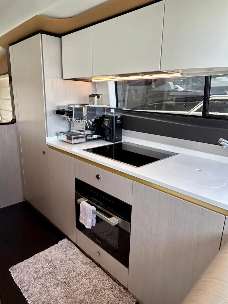 Slide: The Image of Modern kitchen in 2023 Azimut Fly 60 yacht with sleek cabinetry and appliances. - 44