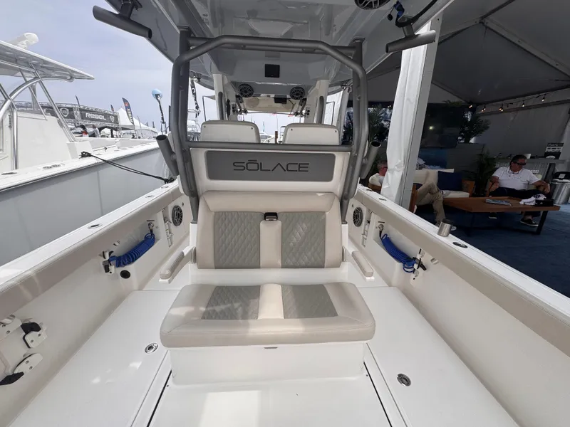 Slide: The Image of 2025 Solace 30 CS boat interior with seating and modern design. - 12