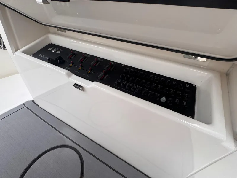 Slide: The Image of Control panel of 2025 Solace 30 CS boat, featuring sleek design and advanced controls. - 20