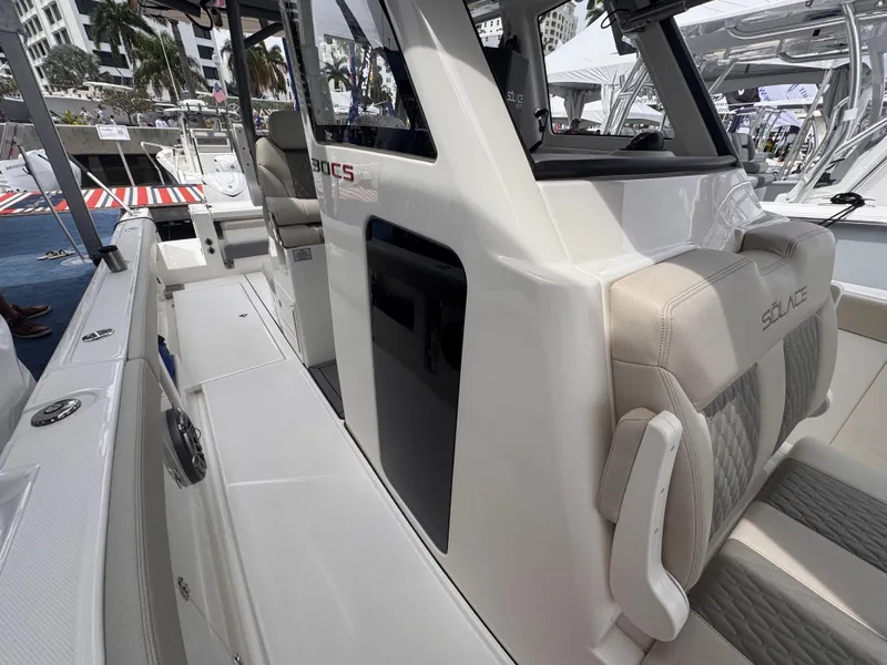 Slide: The Image of 2025 Solace 30 CS boat interior with modern seating and sleek design. - 38