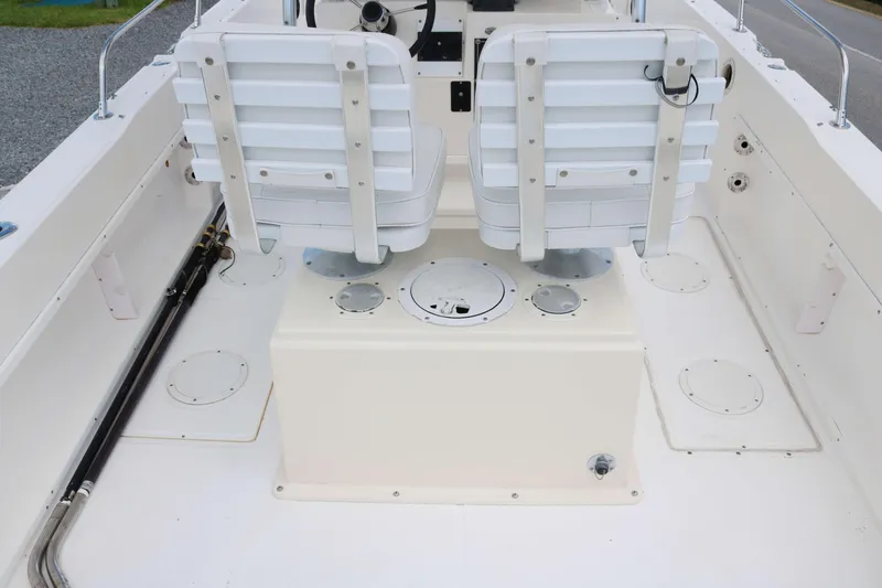 Slide: The Image of 1996 Sea Cat SL5 boat interior with dual white seats and clean deck layout. - 10