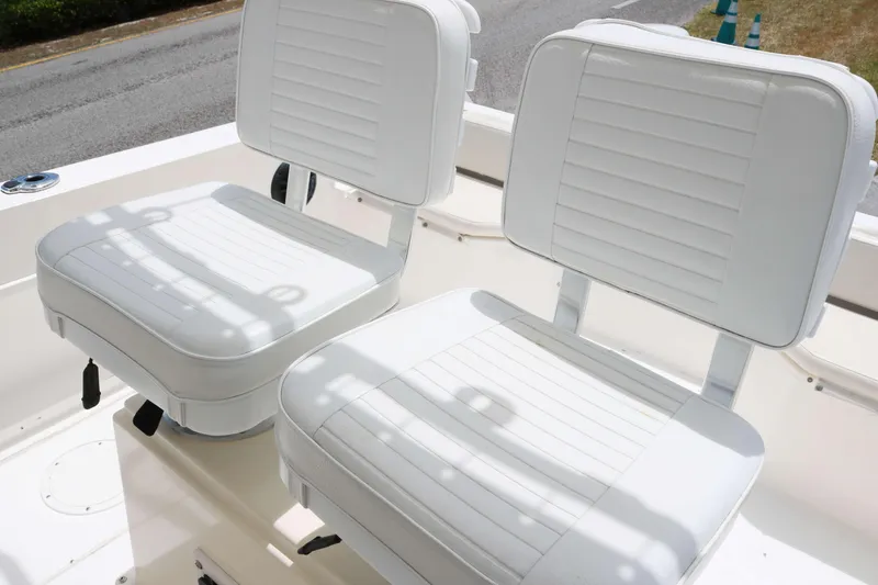 Slide: The Image of White seats on a 1996 Sea Cat SL5 boat deck. - 7