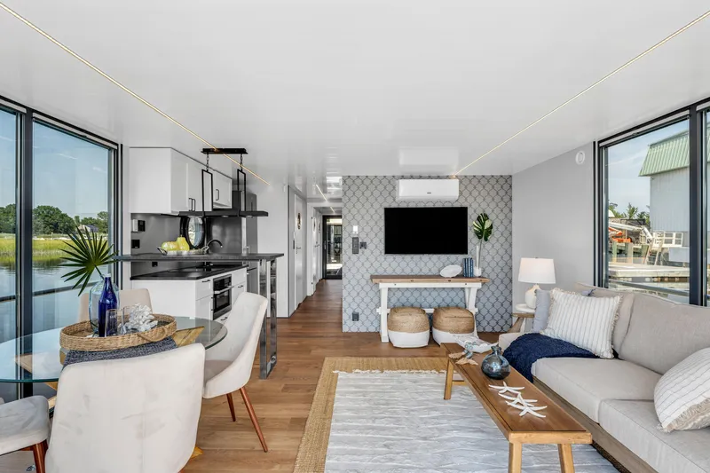 Slide: The Image of Modern Waterlodge Apart XXL 2025 interior with stylish decor, open kitchen, and cozy living area. - 17