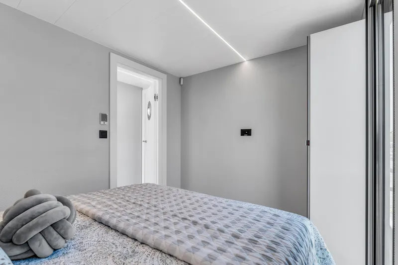 Slide: The Image of Modern bedroom interior in Waterlodge Apart XXL 2025, featuring minimalist design and cozy bedding. - 27