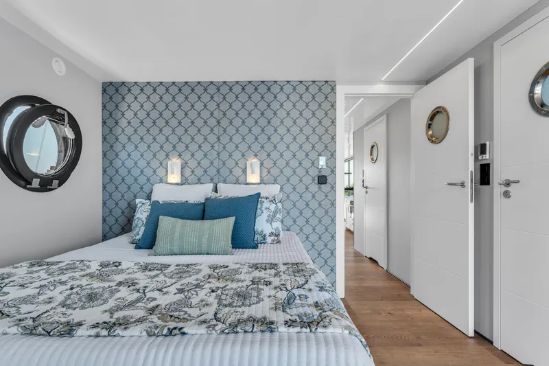 Slide: The Image of Modern bedroom in Waterlodge Apart XXL 2025, featuring nautical decor and elegant design. - 30