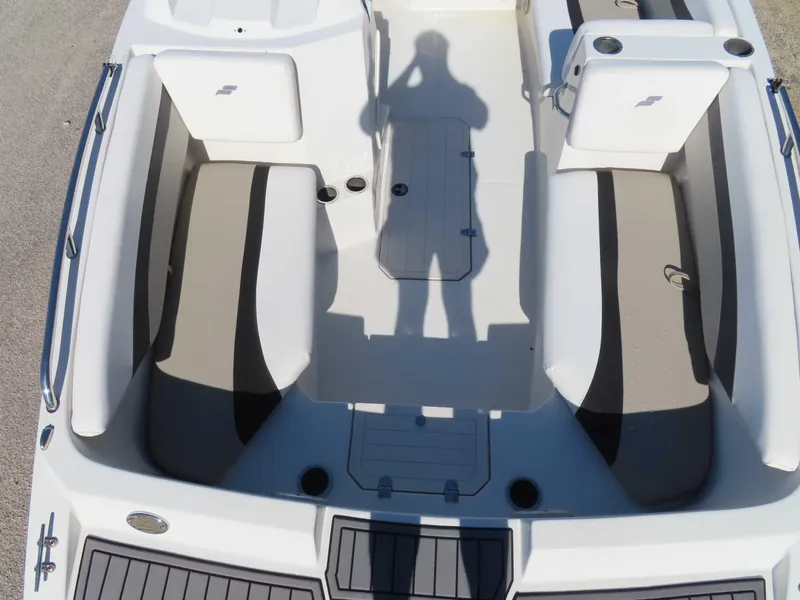 Slide: The Image of 2022 Starcraft SVX 171 boat interior with seating and shadow on deck. - 12