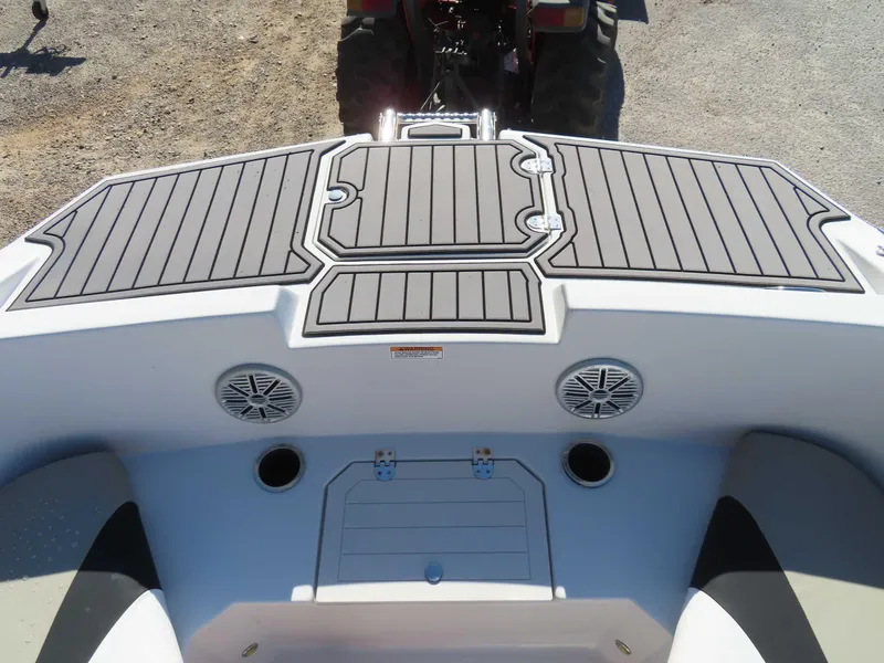 Slide: The Image of 2022 Starcraft SVX 171 boat interior with speakers and storage compartments. - 13