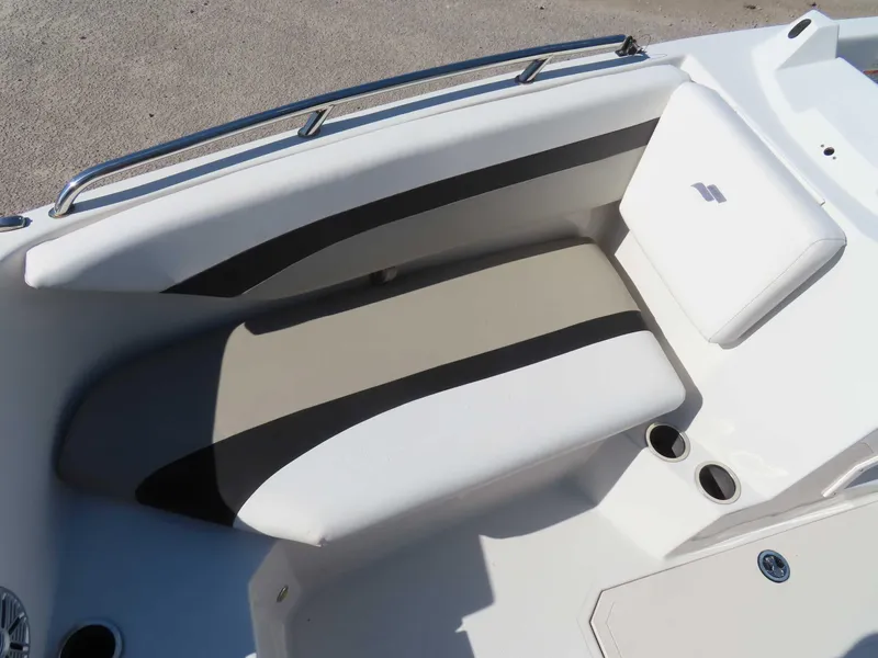 Slide: The Image of 2022 Starcraft SVX 171 boat interior seating with cup holders and sleek design. - 14