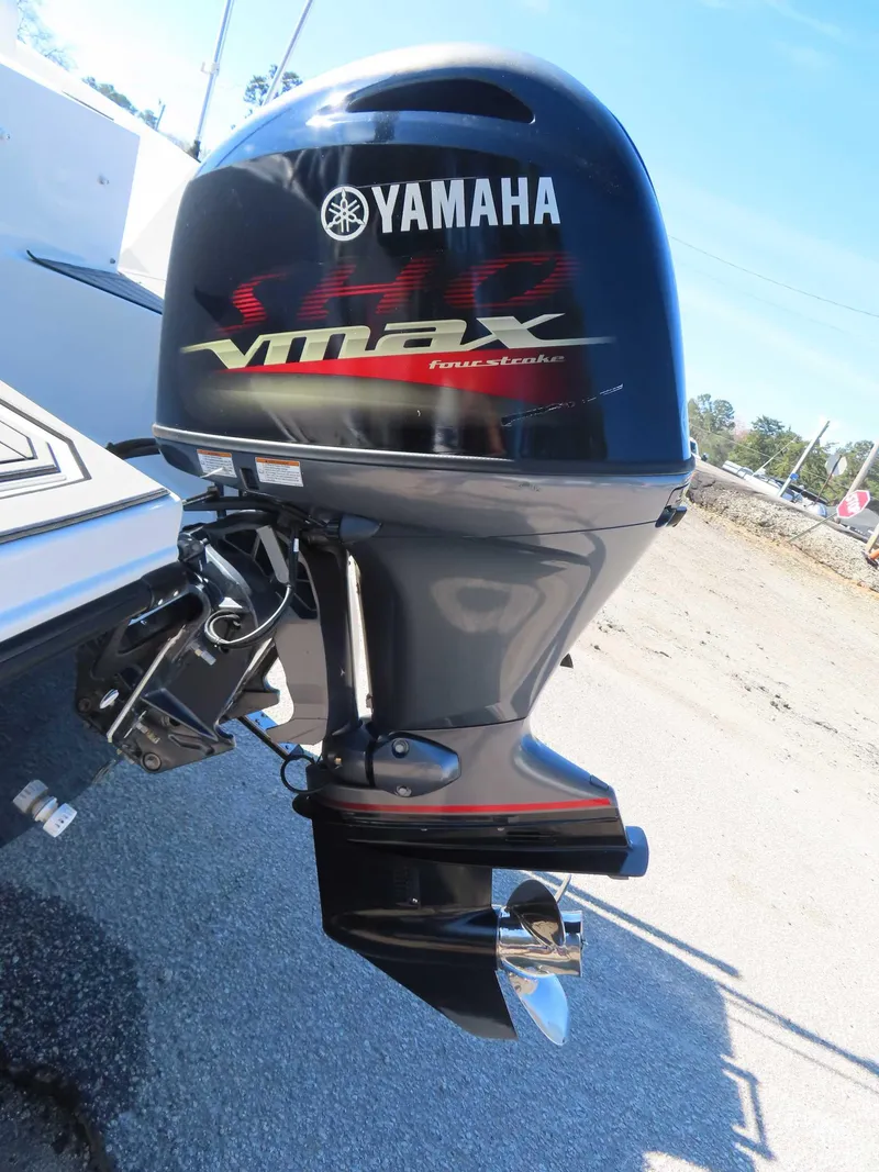 Slide: The Image of Yamaha VMAX outboard motor on 2022 Starcraft SVX 171 boat, parked on a sunny day. - 19