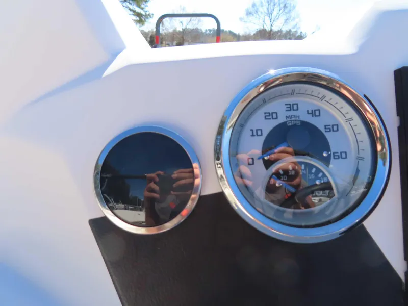 Slide: The Image of Dashboard of 2022 Starcraft SVX 171 boat with speedometer and reflection. - 5