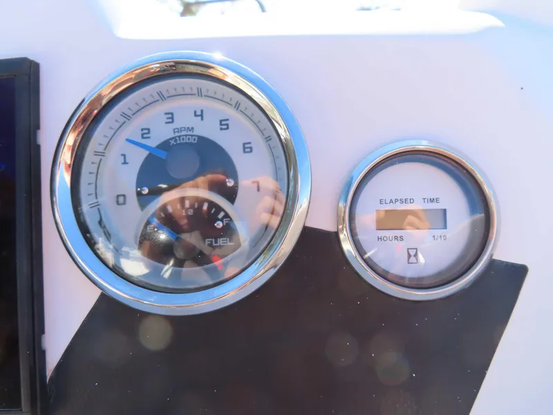 Slide: The Image of Dashboard of 2022 Starcraft SVX 171 showing RPM and elapsed time gauges. - 6