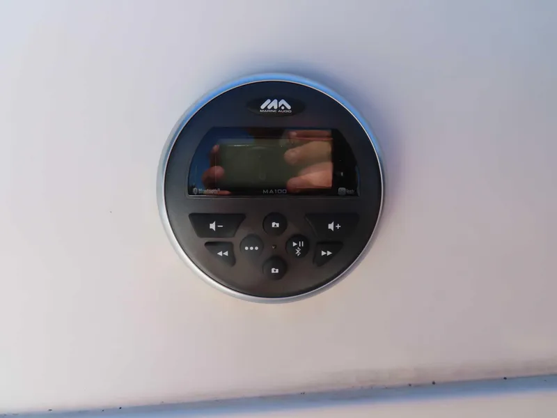 Slide: The Image of Round marine audio control panel on 2022 Starcraft SVX 171 boat. - 7