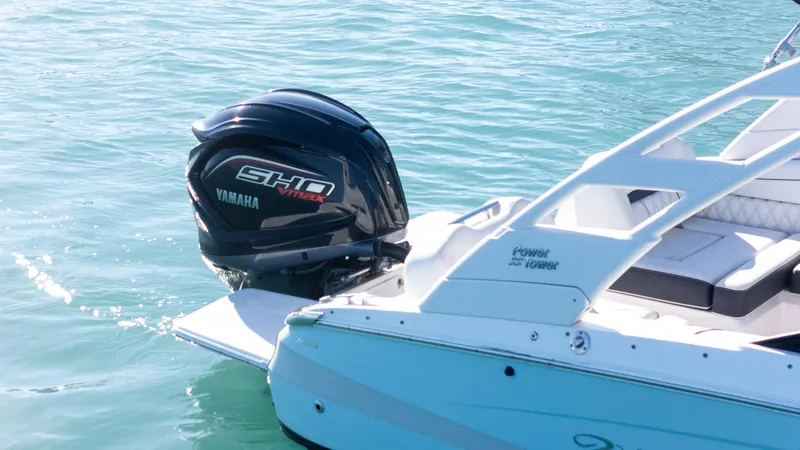 Slide: The Image of 2022 Regal LX2 boat with Yamaha SHO VMAX engine on clear water. - 21