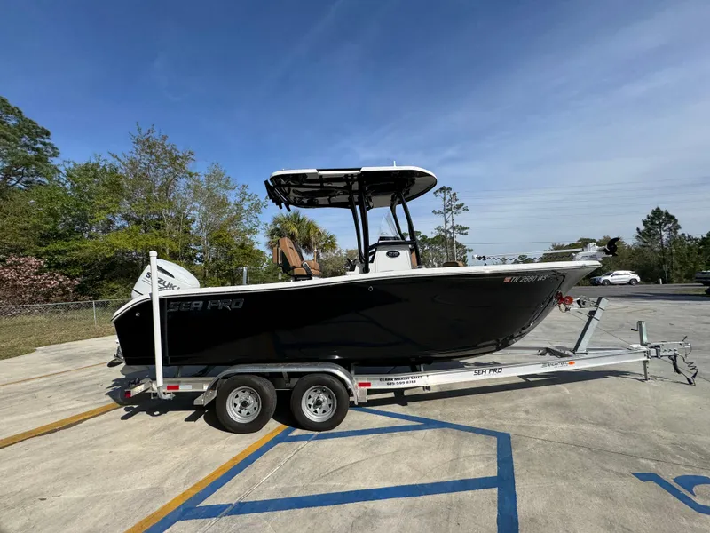 Slide: The Image of 2023 Sea Pro 219 Deep V CC boat on trailer in parking lot. - 10