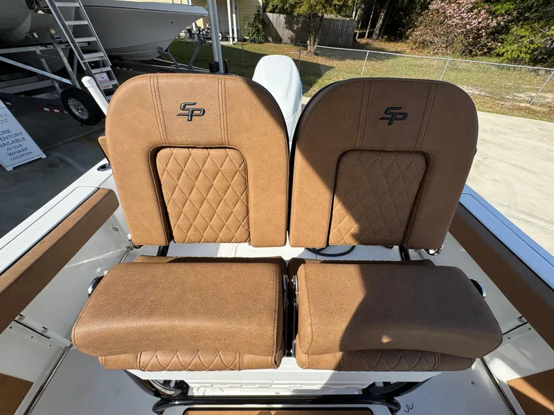 Slide: The Image of 2023 Sea Pro 219 Deep V CC boat seats with brown diamond-stitched upholstery. - 29