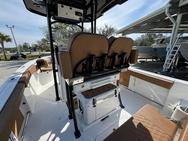 Slide: The Image of 2023 Sea Pro 219 Deep V CC boat interior with seating and storage. - 34