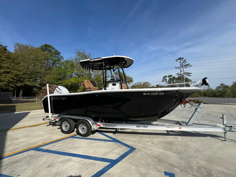Slide: The Image of 2023 Sea Pro 219 Deep V CC boat on trailer, parked outdoors. - 9