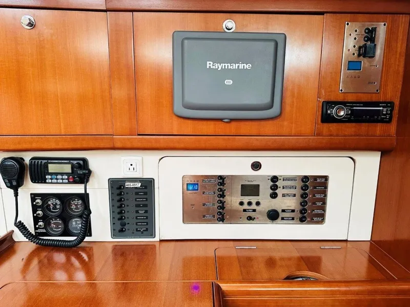 Slide: The Image of Control panel of a 2007 Beneteau 49' Cruiser with Raymarine navigation system. - 21