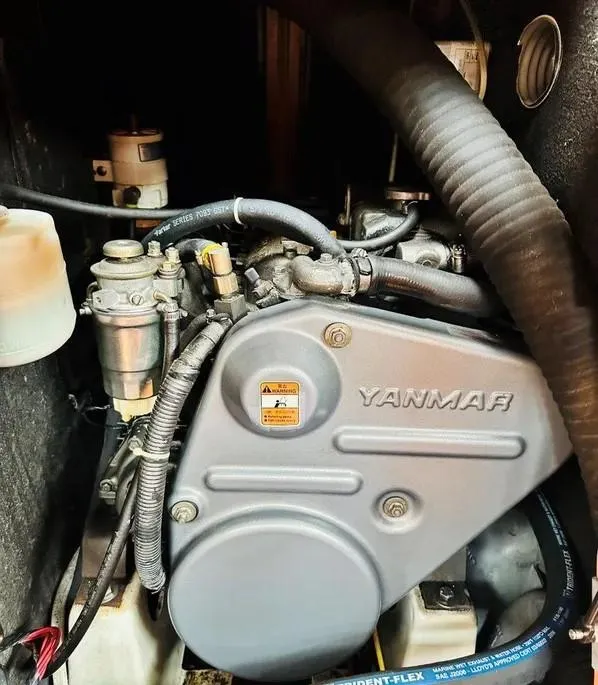 Slide: The Image of Engine compartment of a 2007 Beneteau 49' Cruiser, featuring a Yanmar engine. - 29