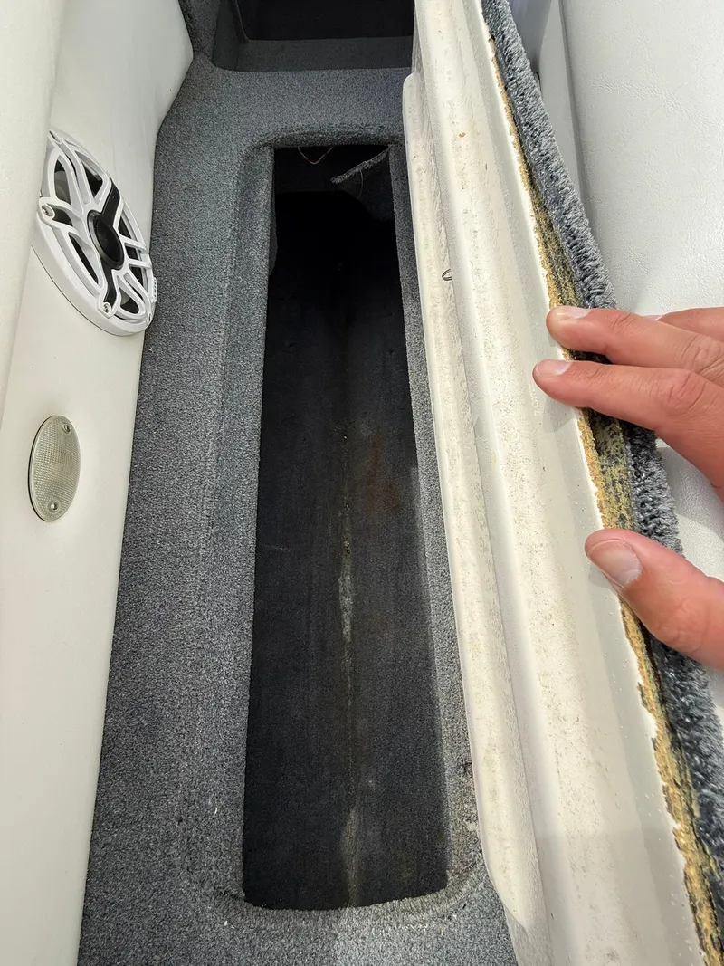 Slide: The Image of Storage compartment in a 2003 Lavey Craft 2750 NUERA boat interior. - 12