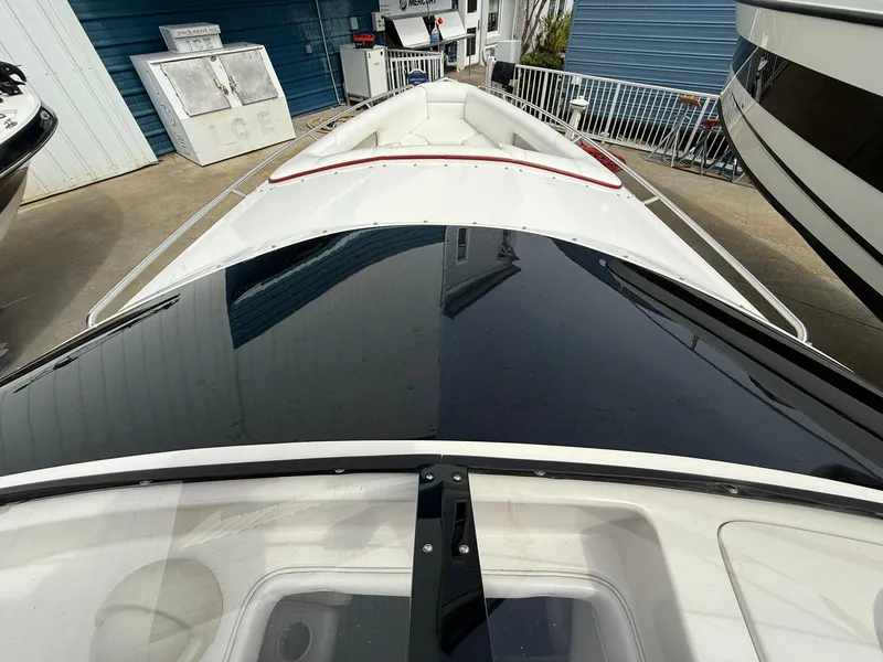 Slide: The Image of 2003 Lavey Craft 2750 NUERA boat, top view, docked at marina. - 13
