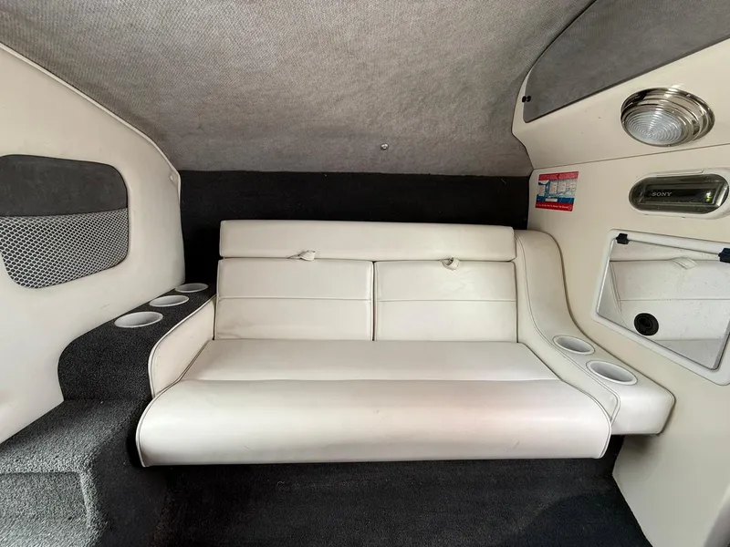 Slide: The Image of 2003 Lavey Craft 2750 NUERA interior with white seating and cup holders. - 17