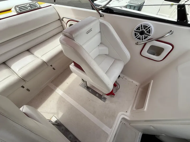 Slide: The Image of 2003 Lavey Craft 2750 NUERA boat interior with white seating and speaker. - 23