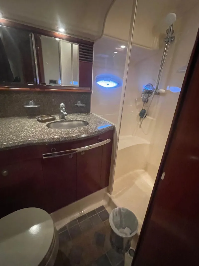 Slide: The Image of Luxurious bathroom in 2005 Sea Ray 500 Sundancer yacht with modern fixtures. - 16