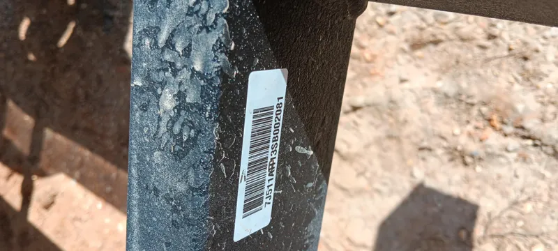 Slide: The Image of 2025 Tracker Bass Tracker Classic XL with barcode sticker on a textured surface. - 31