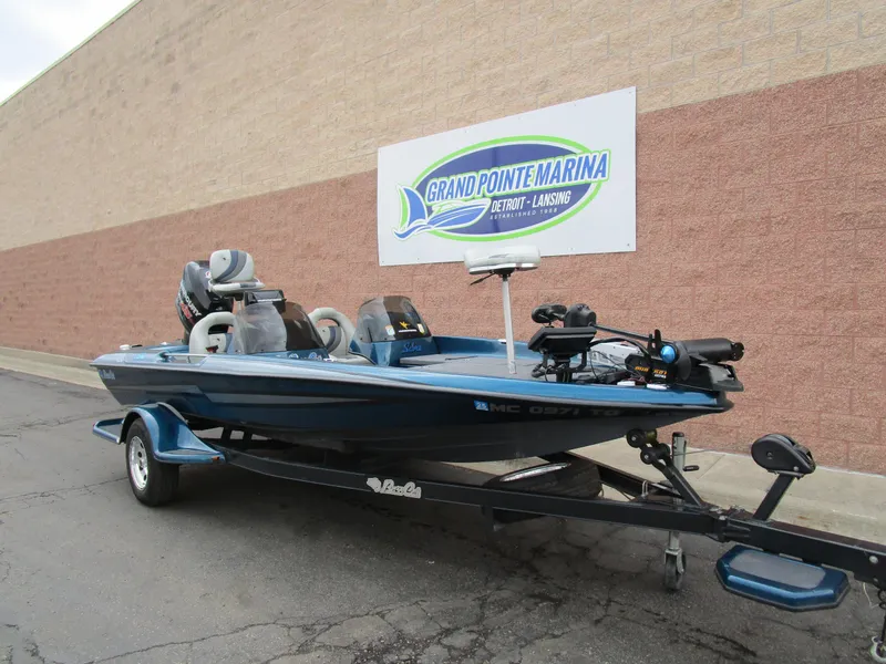 Slide: The Image of 2013 Bass Cat Sabre boat on trailer at Grand Pointe Marina. - 3