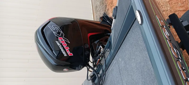 Slide: The Image of 2025 Ranger RT188C boat with Mercury Pro XS outboard motor, side view. - 7