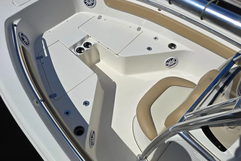 Slide: The Image of 2019 Key West 203 FS boat interior with seating and cup holders. - 17