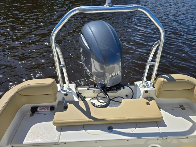 Slide: The Image of 2019 Key West 203 FS boat with Yamaha 150 engine on calm water. - 7