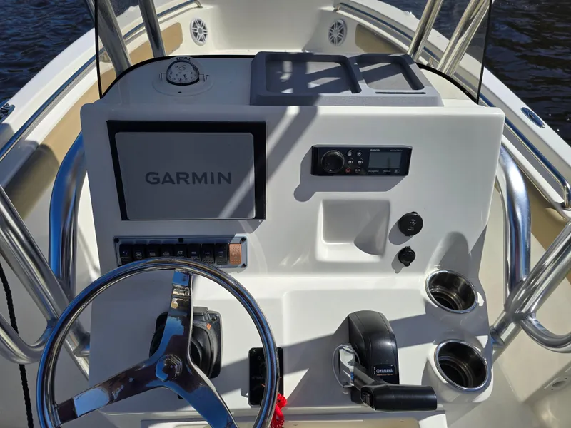 Slide: The Image of 2019 Key West 203 FS boat dashboard with Garmin navigation system and controls. - 9