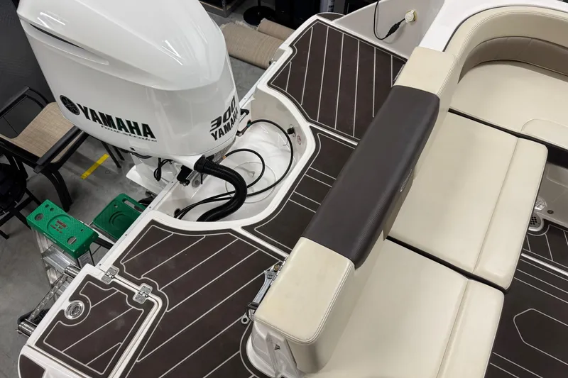 Slide: The Image of 2019 Robalo R242 Explorer boat with Yamaha 300 engine, featuring sleek seating and deck design. - 20
