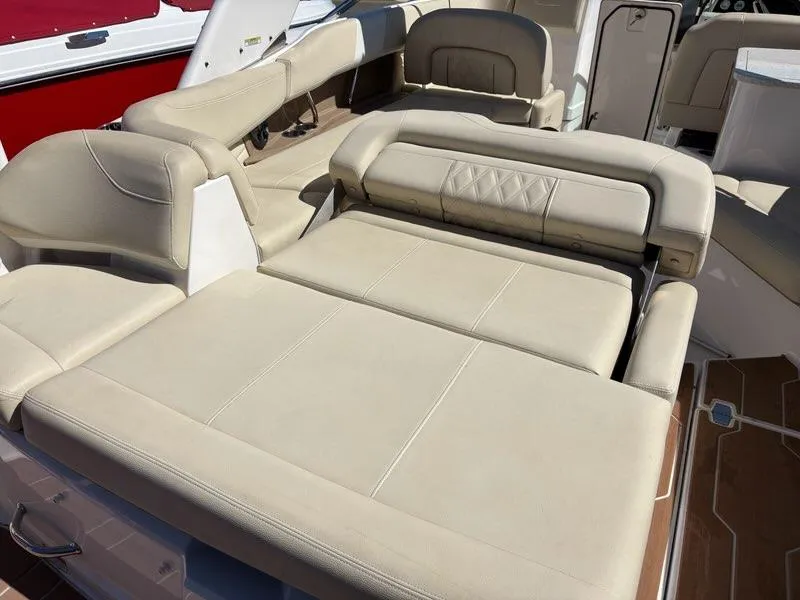 Slide: The Image of Luxurious seating on 2018 Regal 26 OBX boat with beige upholstery. - 6