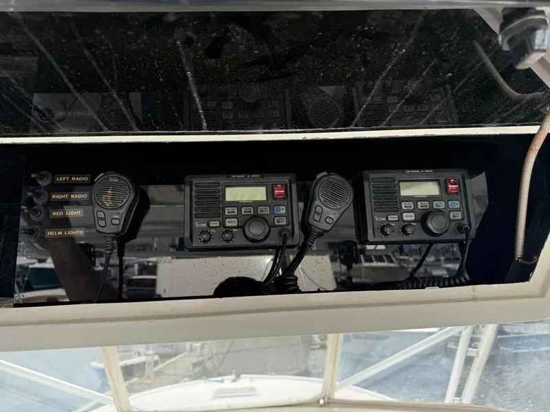 Slide: The Image of 2005 Out Island 38 Express Fisherman boat radio equipment and controls. - 11