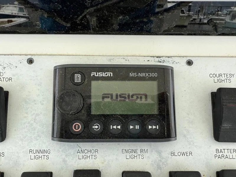 Slide: The Image of Fusion MS-NRX300 marine stereo on 2005 Out Island 38 Express Fisherman boat console. - 20