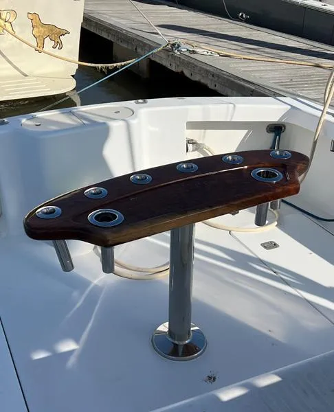 Slide: The Image of 2005 Out Island 38 Express Fisherman boat with rod holders on deck. - 4