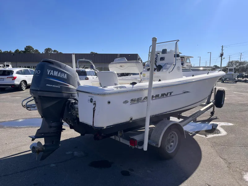 Slide: The Image of 2010 Sea Hunt Triton 177 boat with Yamaha outboard motor on trailer. - 5