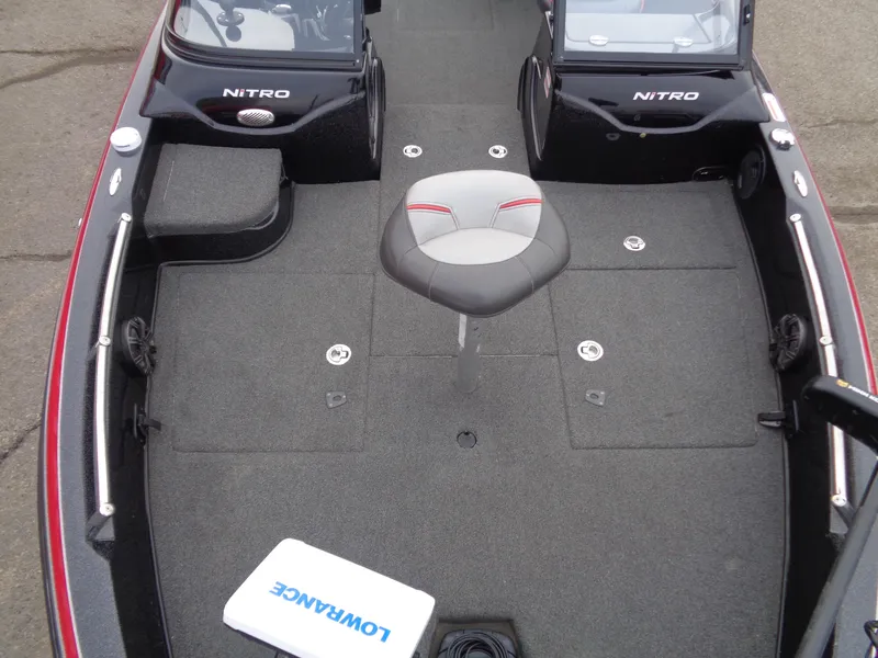 Slide: The Image of 2018 Nitro ZV21 boat interior with seating and Lowrance equipment. - 13