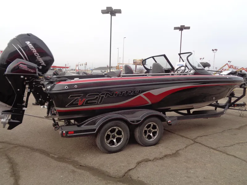 Slide: The Image of 2018 Nitro ZV21 boat with Mercury engine on trailer in parking lot. - 3