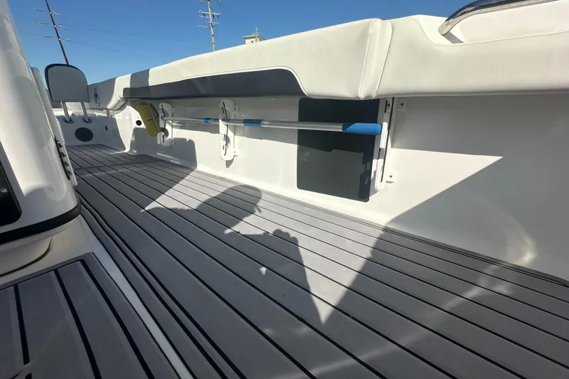 Slide: The Image of 2023 Tidewater 2700 Carolina Bay boat interior with sleek deck design. - 20