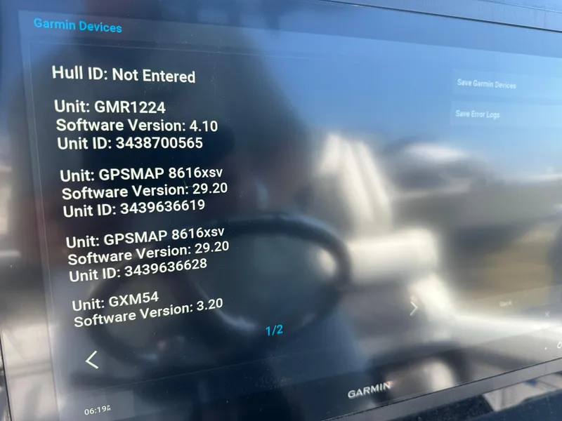 Slide: The Image of Garmin device screen on 2023 Tidewater 2700 Carolina Bay boat, displaying software versions. - 30