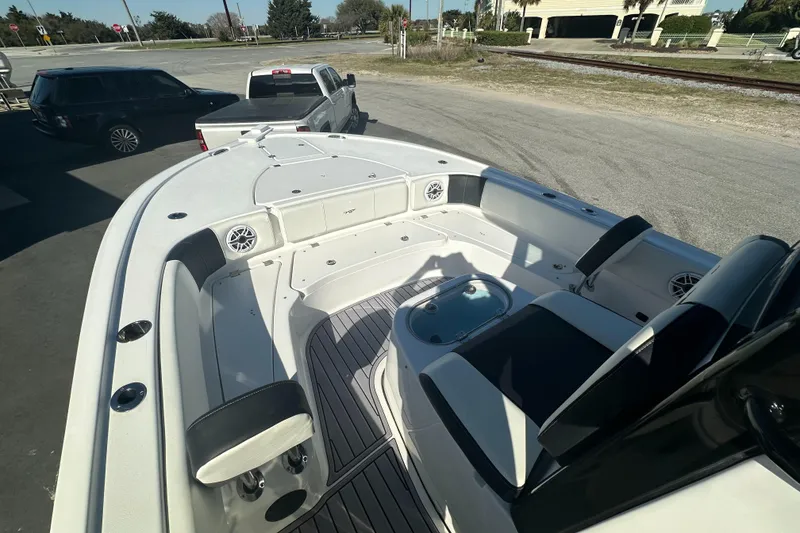 Slide: The Image of 2023 Tidewater 2700 Carolina Bay boat interior with seating and steering console. - 36