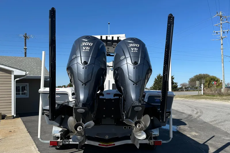 Slide: The Image of 2023 Tidewater 2700 Carolina Bay with twin 300 V6 engines, rear view. - 4