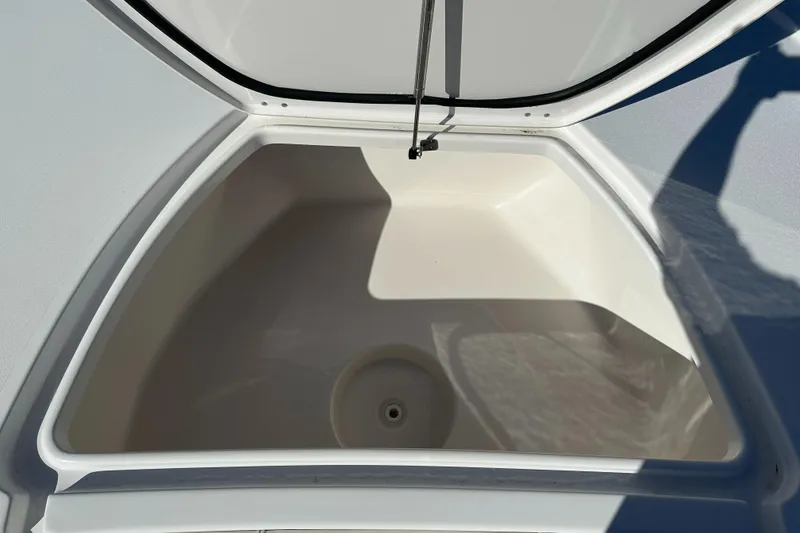 Slide: The Image of Open storage compartment on 2023 Tidewater 2700 Carolina Bay boat. - 40
