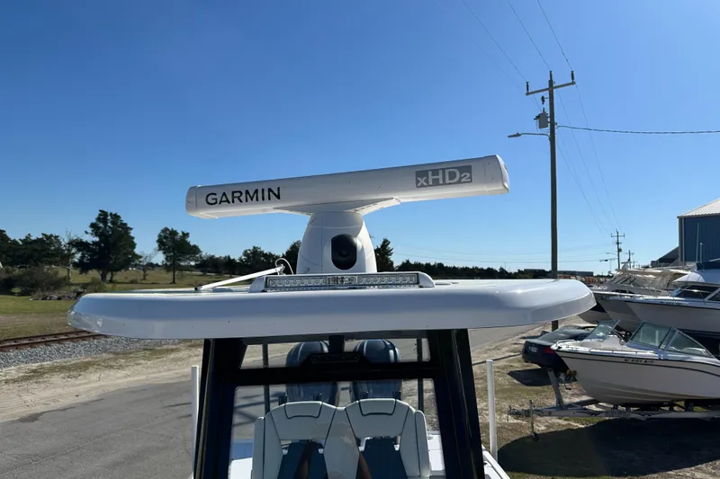 Slide: The Image of 2023 Tidewater 2700 Carolina Bay boat with Garmin xHD2 radar on top. - 45