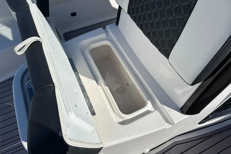 Slide: The Image of 2023 Tidewater 2700 Carolina Bay boat seat with built-in storage compartment. - 48