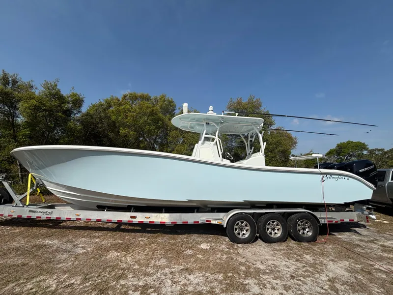 Slide: The Image of Yellowfin Boats, Contender Boats, SeaVee Boats, Regulator Boats, SeaHunter Boats, Invincible Boats, Pair Marine, Southport, REV Yacht Sales - 0